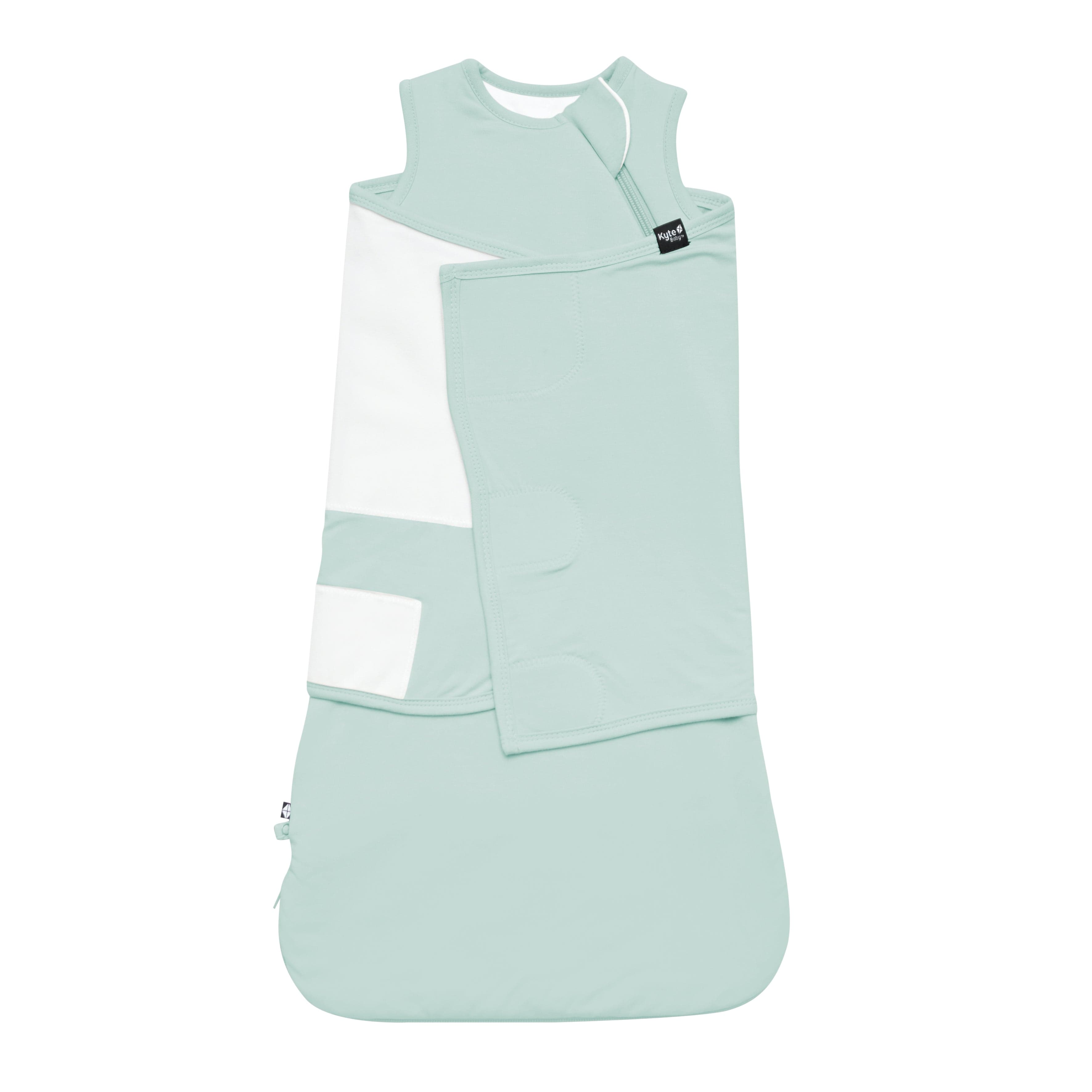 Flat lay of Kyte Baby Sleep Bag Swaddler in Sage with swaddling piece attached