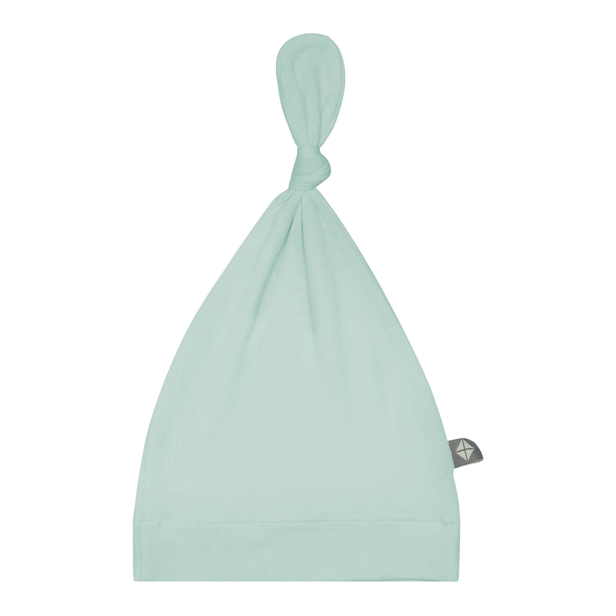 Flat lay of Kyte Baby Knotted Cap in Sage