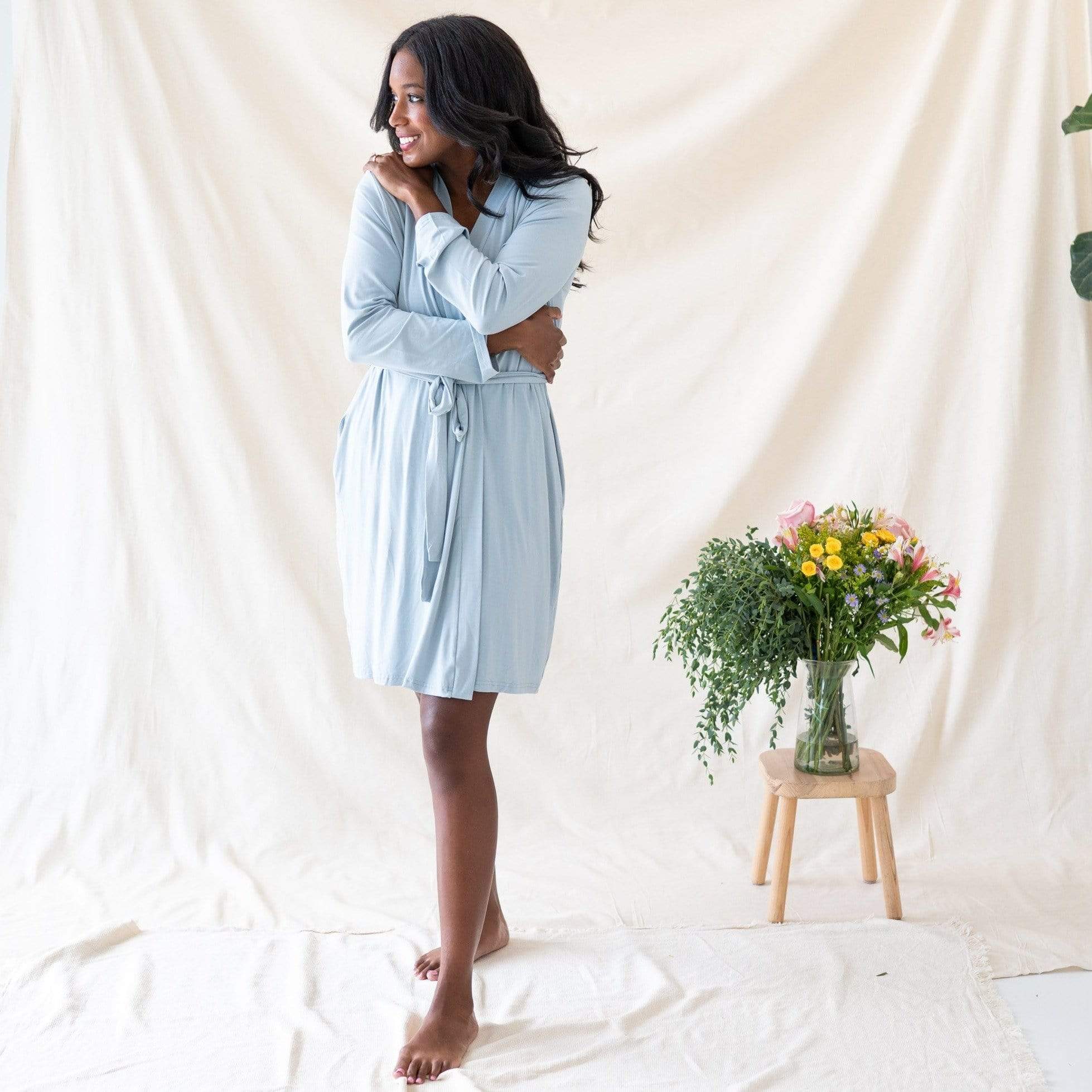Woman wearing Kyte Baby Women’s Lounge Robe with 3/4 hem in Fog gray